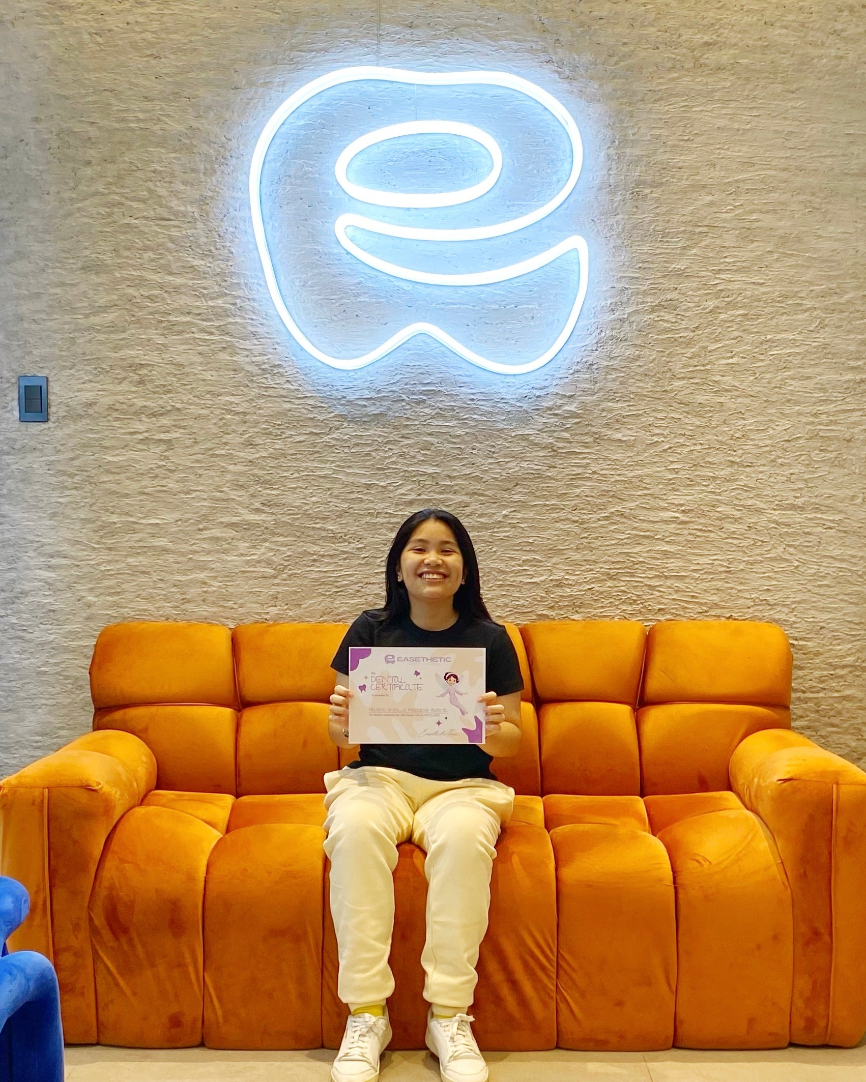 Pediatric dentist performing pulpectomy for infected baby tooth at Easethetic Dental Lounge, Quezon City